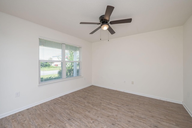 728 Widgeon Way, Crestview, FL 32539 - spare room with light wood-style floors and a ceiling fan