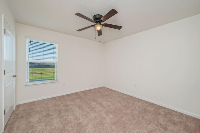728 Widgeon Way, Crestview, FL 32539 - carpeted spare room featuring baseboards and ceiling fan
