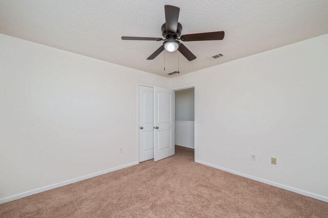 728 Widgeon Way, Crestview, FL 32539 - empty room featuring light colored carpet and a ceiling fan