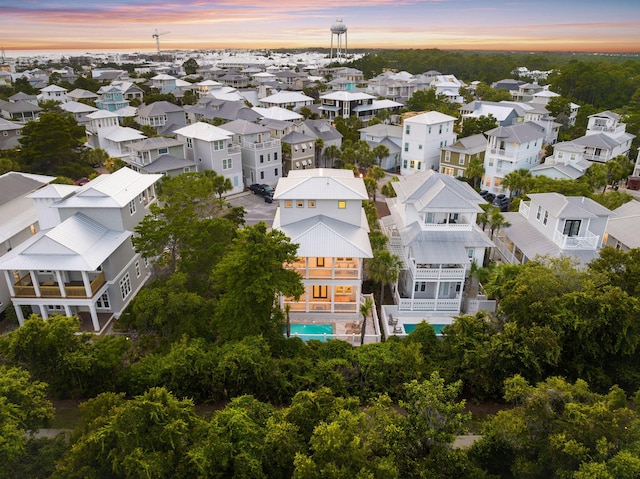 24 Barefoot Ln, Inlet Beach, FL 32461 - aerial view at dusk of a residential view and view of pool area