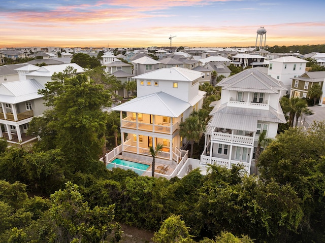 24 Barefoot Ln, Inlet Beach, FL 32461 - aerial view at dusk of a residential view