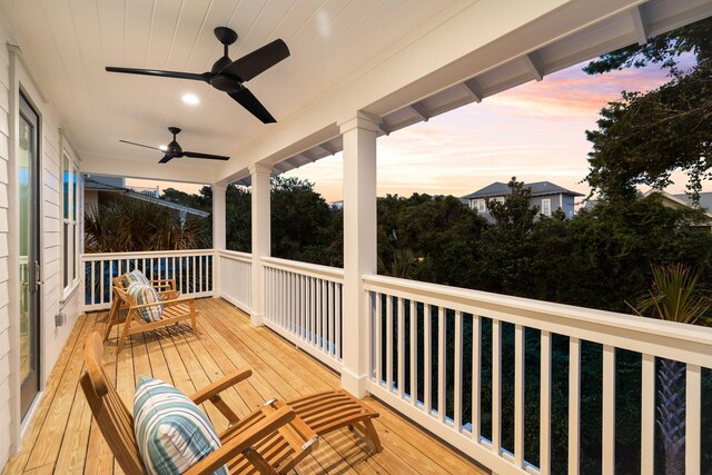 24 Barefoot Ln, Inlet Beach, FL 32461 - deck at dusk with a ceiling fan