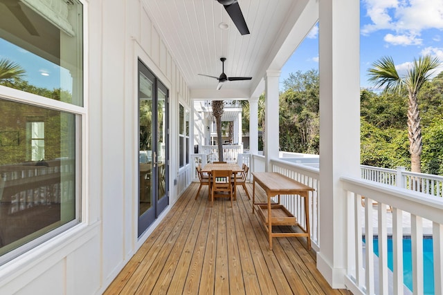 24 Barefoot Ln, Inlet Beach, FL 32461 - wooden terrace with a ceiling fan and an outdoor pool