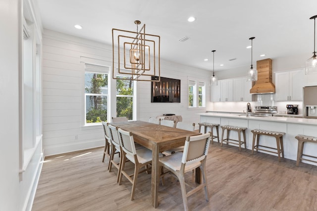 24 Barefoot Ln, Inlet Beach, FL 32461 - dining space with light wood-style floors, recessed lighting, and a chandelier