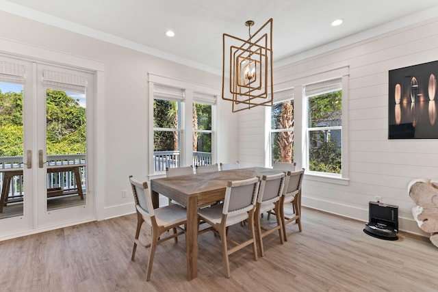 24 Barefoot Ln, Inlet Beach, FL 32461 - dining area with plenty of natural light, a chandelier, wood finished floors, recessed lighting, and wood walls