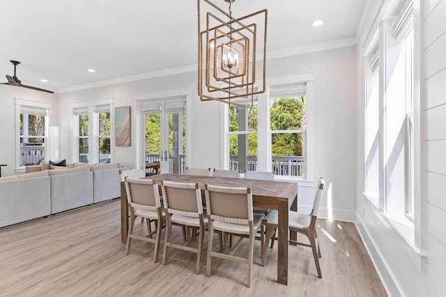 24 Barefoot Ln, Inlet Beach, FL 32461 - dining area with light wood finished floors, a chandelier, recessed lighting, crown molding, and french doors
