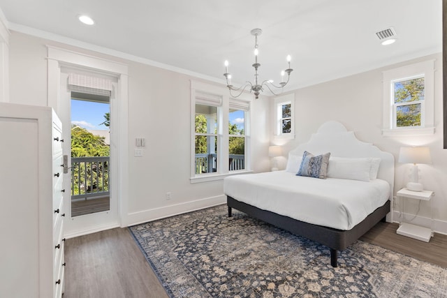 24 Barefoot Ln, Inlet Beach, FL 32461 - bedroom featuring wood finished floors, access to exterior, a chandelier, multiple windows, and recessed lighting