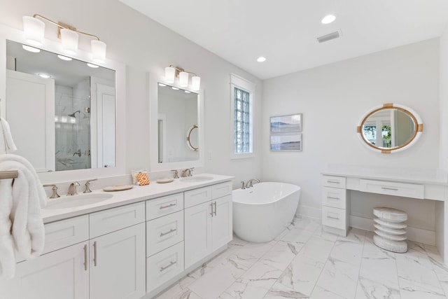 24 Barefoot Ln, Inlet Beach, FL 32461 - bathroom featuring double vanity, a shower stall, a freestanding tub, recessed lighting, and marble finish floors