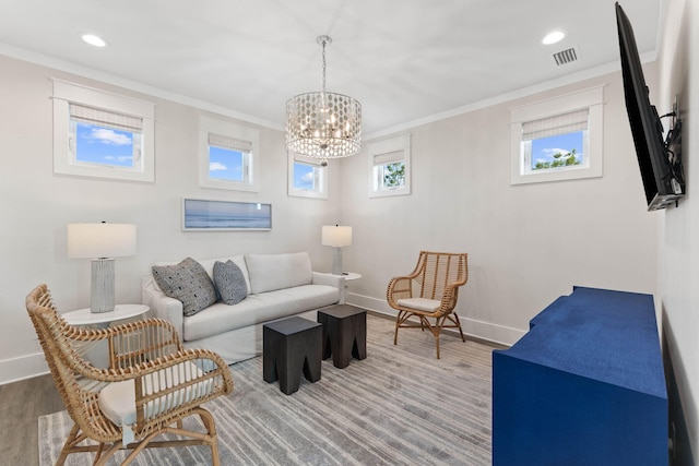 24 Barefoot Ln, Inlet Beach, FL 32461 - living area with a chandelier, wood finished floors, ornamental molding, and recessed lighting