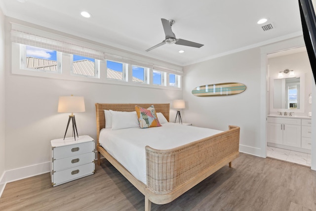 24 Barefoot Ln, Inlet Beach, FL 32461 - bedroom with ornamental molding, light wood-style flooring, ensuite bath, recessed lighting, and ceiling fan