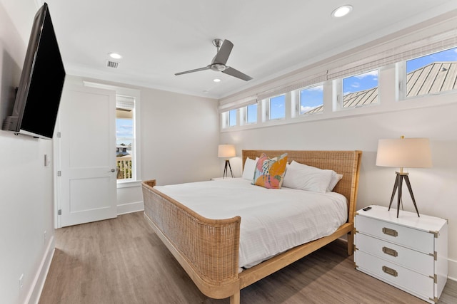 24 Barefoot Ln, Inlet Beach, FL 32461 - bedroom featuring light wood-type flooring, recessed lighting, crown molding, and a ceiling fan