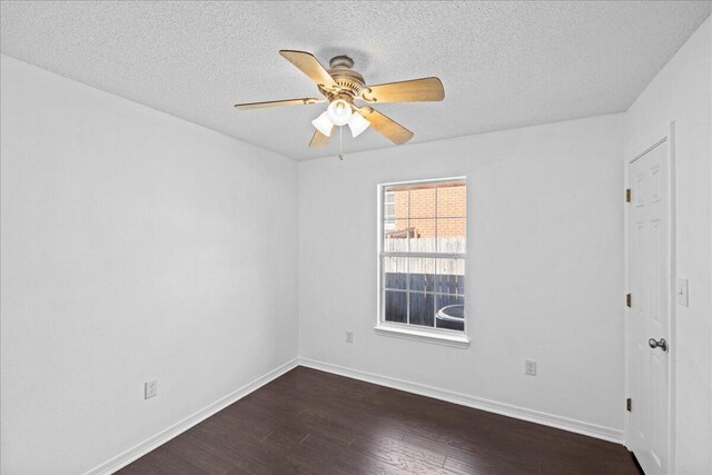 5408 Josh Dr, Crestview, FL 32536 - unfurnished room featuring dark wood-type flooring, a textured ceiling, and a ceiling fan