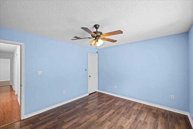 5408 Josh Dr, Crestview, FL 32536 - unfurnished bedroom featuring wood finished floors, a closet, a textured ceiling, and ceiling fan