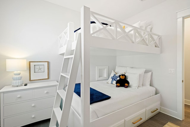 209 Milestone Dr Unit A, Inlet Beach, FL 32461 - bedroom with dark wood-style flooring and baseboards