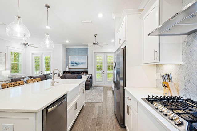 209 Milestone Dr Unit A, Inlet Beach, FL 32461 - kitchen with open floor plan, stainless steel appliances, ceiling fan, ventilation hood, and french doors