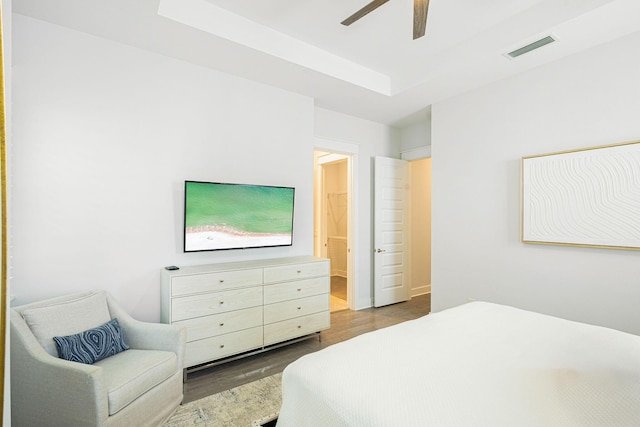 209 Milestone Dr Unit A, Inlet Beach, FL 32461 - bedroom featuring wood finished floors, a raised ceiling, and ceiling fan