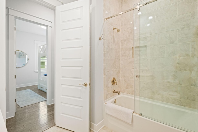 209 Milestone Dr Unit A, Inlet Beach, FL 32461 - bathroom featuring combined bath / shower with glass door and wood finished floors