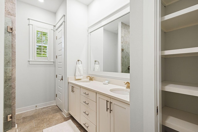 209 Milestone Dr Unit A, Inlet Beach, FL 32461 - bathroom featuring double vanity, a stall shower, and a closet