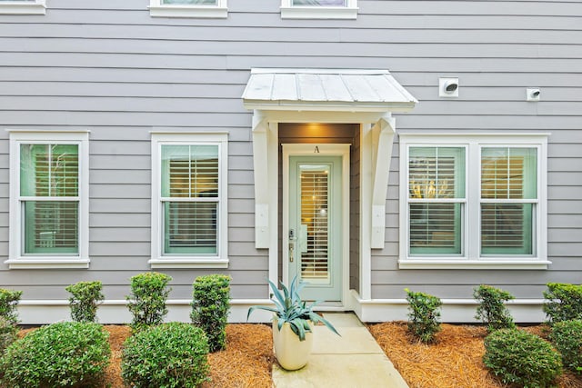 209 Milestone Dr Unit A, Inlet Beach, FL 32461 - entrance to property with a standing seam roof and a metal roof