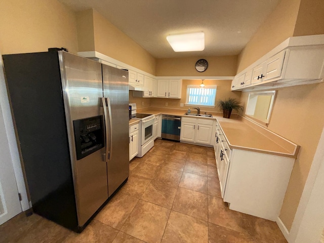 905 Cloverdale Ct, Fort Walton Beach, FL 32547 - kitchen featuring stainless steel fridge, electric range, dishwasher, white cabinetry, and light countertops