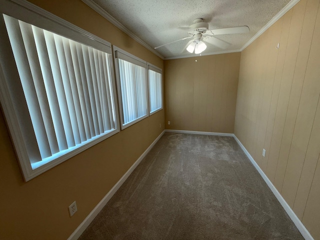 905 Cloverdale Ct, Fort Walton Beach, FL 32547 - carpeted empty room featuring a ceiling fan, a textured ceiling, and ornamental molding
