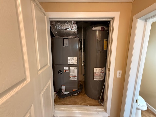 905 Cloverdale Ct, Fort Walton Beach, FL 32547 - utility room with electric water heater and heating unit