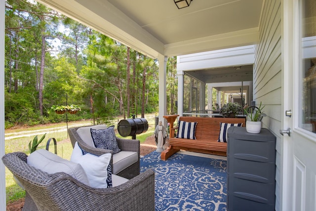 148 N Sand Palm Rd, Freeport, FL 32439 - deck featuring a sunroom