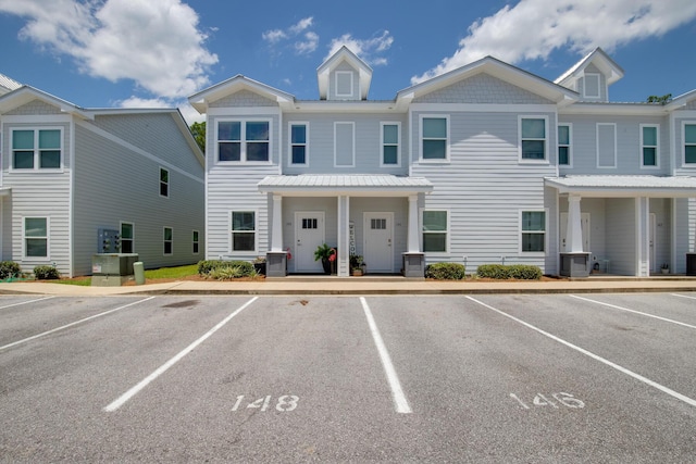 148 N Sand Palm Rd, Freeport, FL 32439 - view of front facade featuring uncovered parking and a porch
