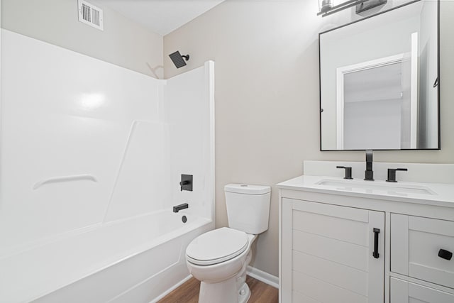 48 4th Ave, Shalimar, FL 32579 - bathroom featuring vanity, wood finished floors, and shower / washtub combination