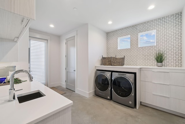 21 Scuttle Hole Rd, Santa Rosa Beach, FL 32459 - laundry room with washing machine and dryer, an accent wall, recessed lighting, and wallpapered walls