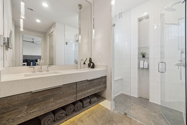 21 Scuttle Hole Rd, Santa Rosa Beach, FL 32459 - ensuite bathroom featuring double vanity, a stall shower, a ceiling fan, and recessed lighting