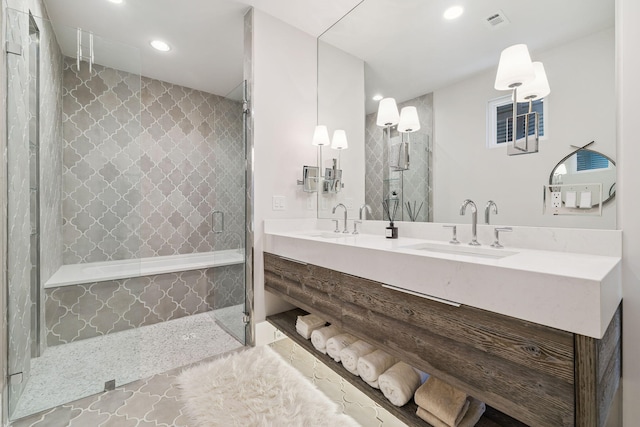 21 Scuttle Hole Rd, Santa Rosa Beach, FL 32459 - full bathroom featuring a tile shower, recessed lighting, and double vanity