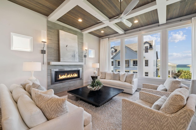 21 Scuttle Hole Rd, Santa Rosa Beach, FL 32459 - living area featuring a large fireplace, healthy amount of natural light, a wooden ceiling with exposed beams, ceiling fan, and coffered ceiling