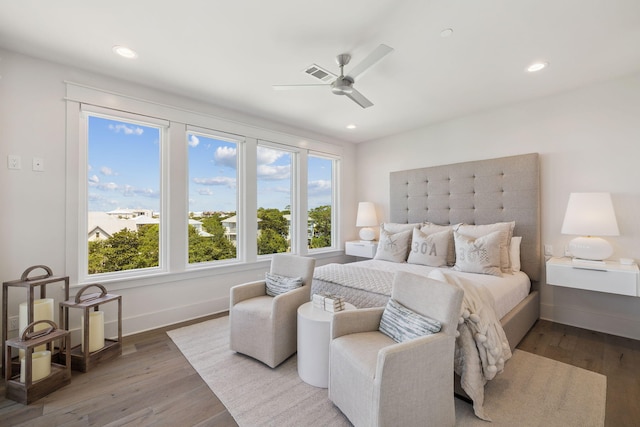 21 Scuttle Hole Rd, Santa Rosa Beach, FL 32459 - bedroom featuring multiple windows, wood finished floors, recessed lighting, and a ceiling fan