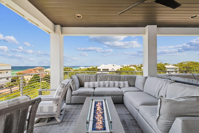 21 Scuttle Hole Rd, Santa Rosa Beach, FL 32459 - patio / terrace featuring an outdoor living space with a fire pit and a water view