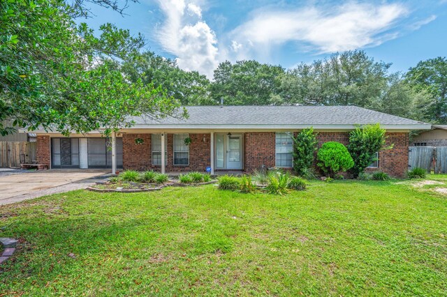 22 James Ave, Shalimar, FL 32579 - ranch-style house featuring brick siding and concrete driveway