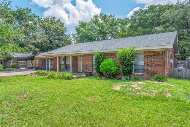 22 James Ave, Shalimar, FL 32579 - ranch-style house featuring brick siding