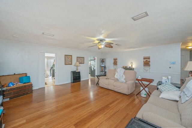 22 James Ave, Shalimar, FL 32579 - living area featuring ceiling fan and light wood finished floors