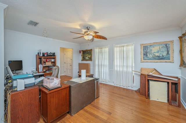 22 James Ave, Shalimar, FL 32579 - home office featuring a ceiling fan, light wood-type flooring, and crown molding