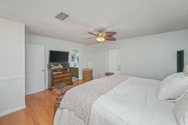 22 James Ave, Shalimar, FL 32579 - bedroom with light wood finished floors and ceiling fan