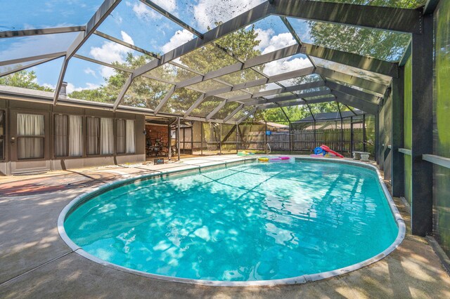22 James Ave, Shalimar, FL 32579 - view of swimming pool with a patio, a fenced backyard, and a lanai
