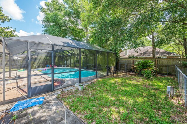 22 James Ave, Shalimar, FL 32579 - fenced backyard featuring a lanai