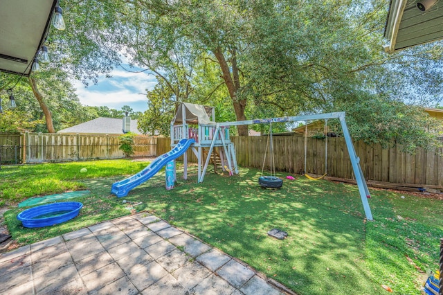 22 James Ave, Shalimar, FL 32579 - view of play area featuring a fenced backyard and a patio