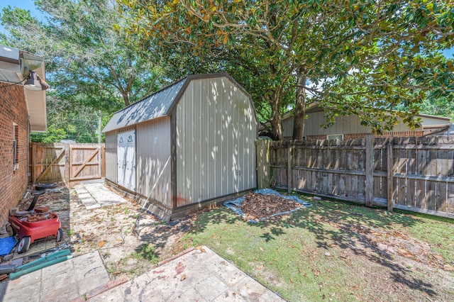 22 James Ave, Shalimar, FL 32579 - view of shed with a fenced backyard and a gate