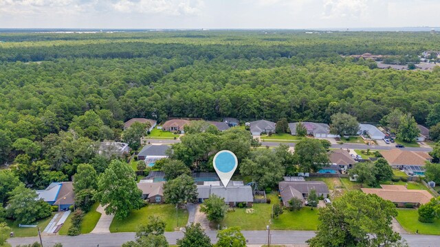 22 James Ave, Shalimar, FL 32579 - aerial perspective of suburban area with a heavily wooded area