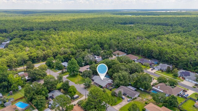 22 James Ave, Shalimar, FL 32579 - aerial view of residential area featuring a forest