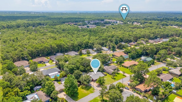 22 James Ave, Shalimar, FL 32579 - aerial perspective of suburban area featuring a heavily wooded area