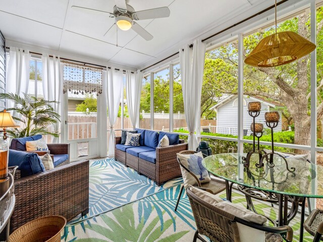 246 Seabreeze Ct, Inlet Beach, FL 32461 - sunroom / solarium featuring ceiling fan, an outdoor living space, and outdoor dining space