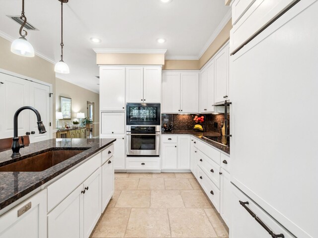 246 Seabreeze Ct, Inlet Beach, FL 32461 - kitchen with crown molding, fridge, backsplash, white cabinetry, and recessed lighting