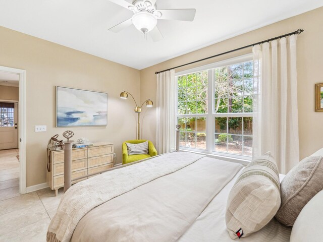 246 Seabreeze Ct, Inlet Beach, FL 32461 - bedroom featuring multiple windows, ceiling fan, and light tile patterned floors